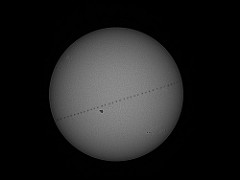 Transit de la Station spatiale devant le Soleil